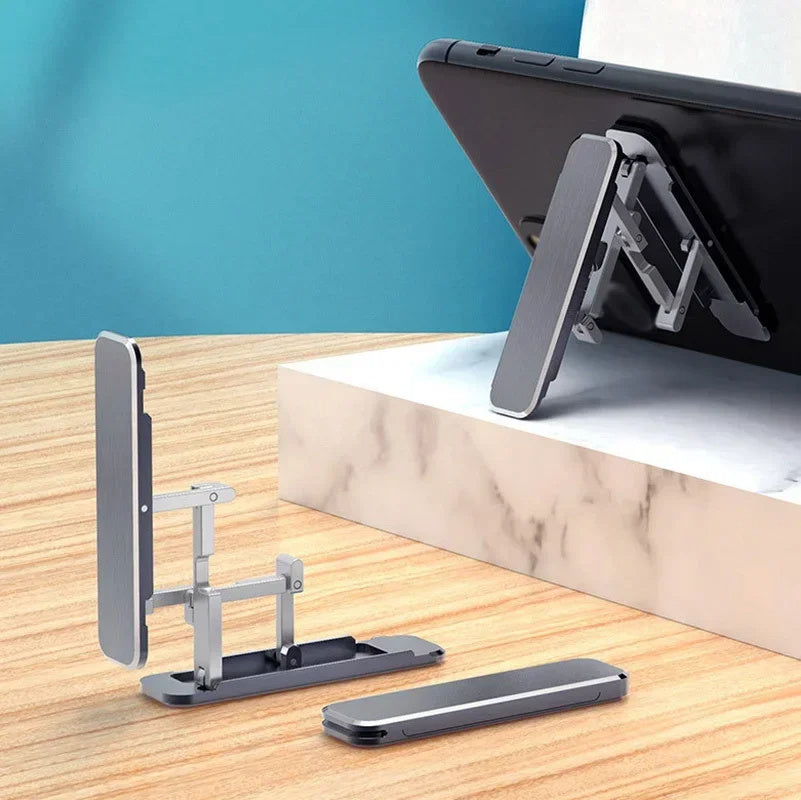 Folding portable phone holder.