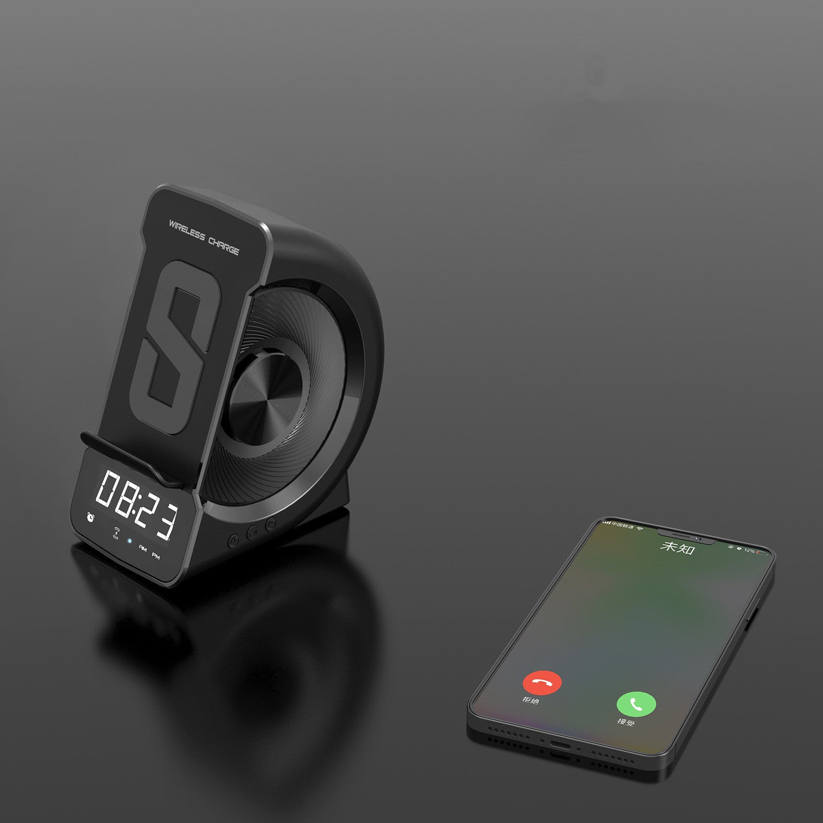 Portable Bluetooth speaker with wireless charging.