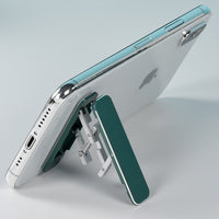 Folding portable phone holder.
