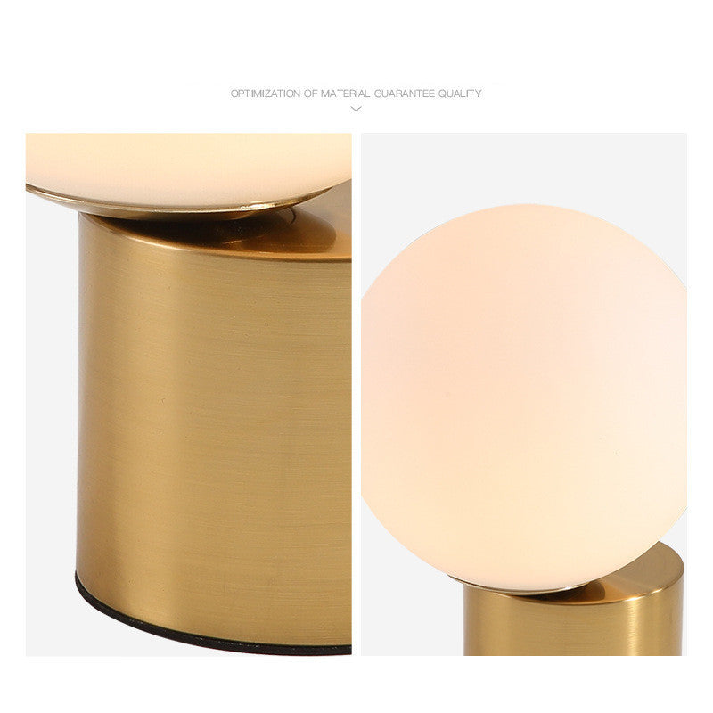 Modern Nordic glass bedside lamp.