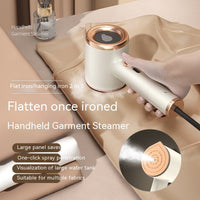 Handheld garment steamer