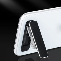 Folding portable phone holder.