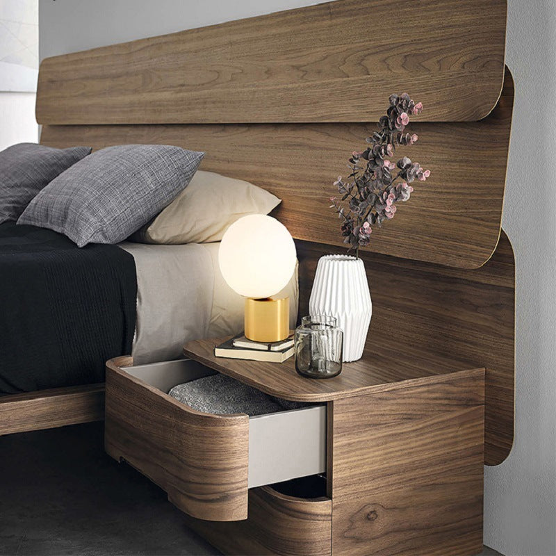 Modern Nordic glass bedside lamp.