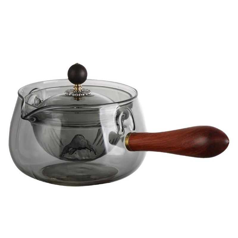 Rotary glass teapot with infuser.
