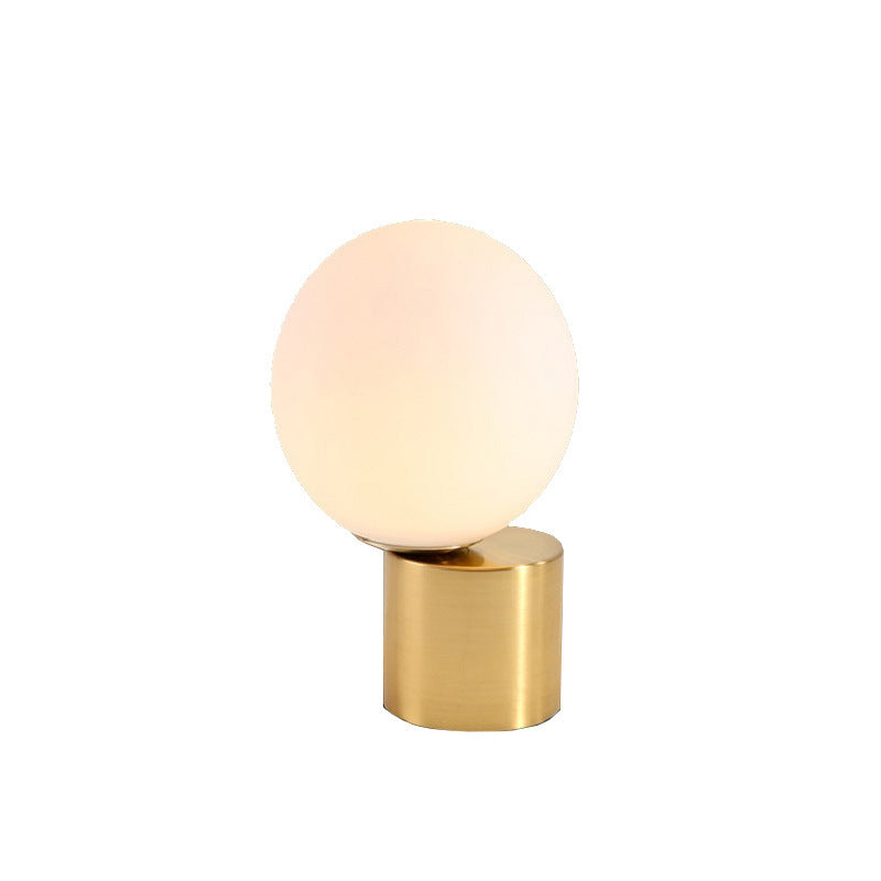 Modern Nordic glass bedside lamp.