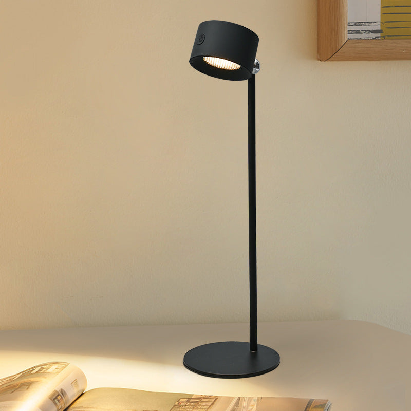 Touchable LED table lamp with magnetic base.