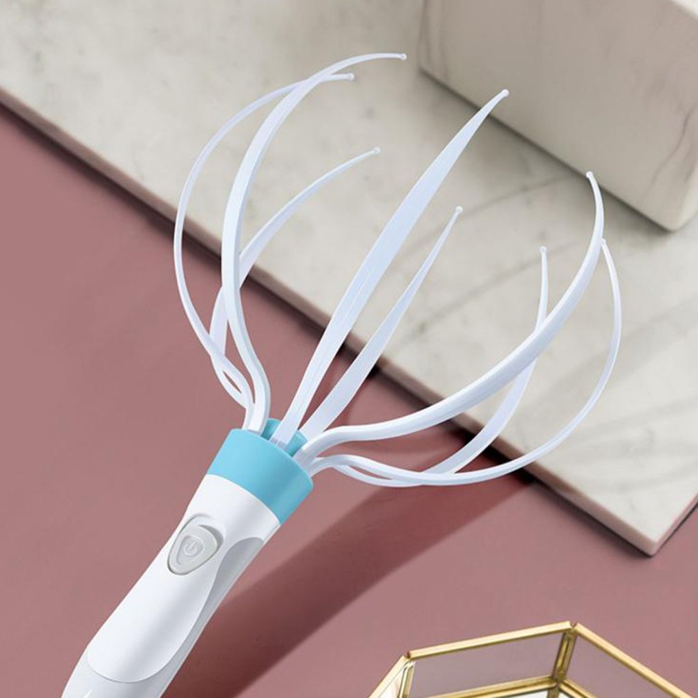 Electric head massager with vibration.