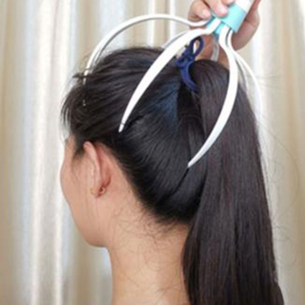 Electric head massager with vibration.