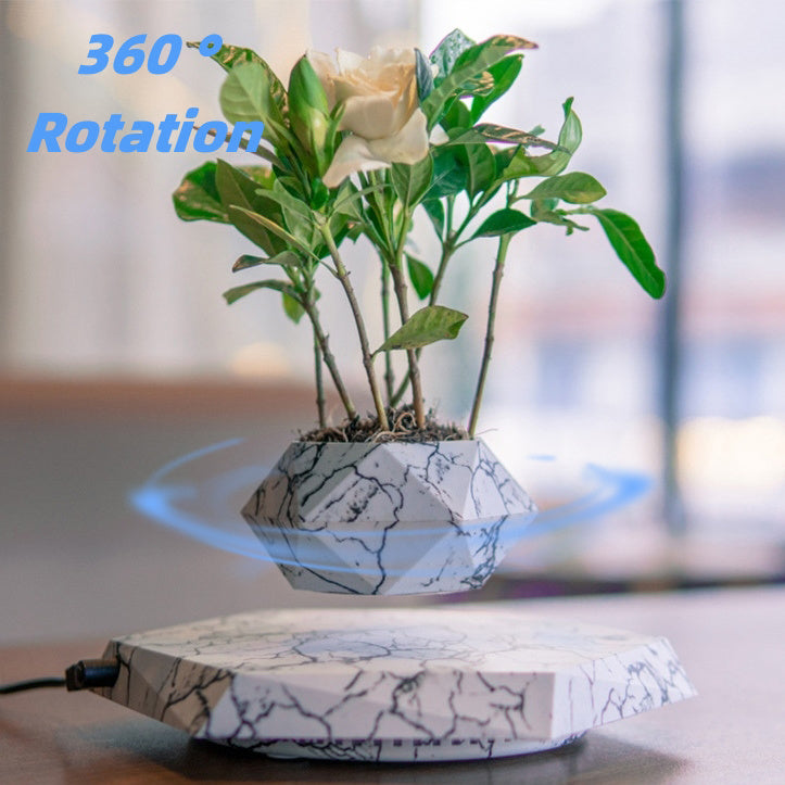 Levitating marble color plant pot.