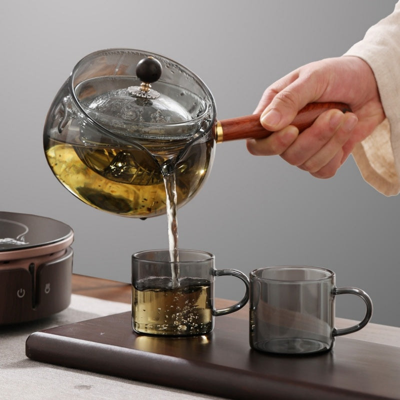 Rotary glass teapot with infuser.